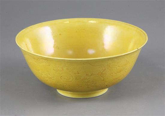 A Chinese yellow ground dragon bowl, Kangxi mark, Guangxu period, 16cm